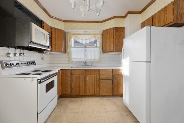 kitchen featuring sink, crown molding, a notable chandelier, white appliances, and backsplash