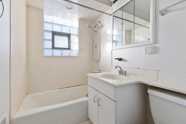 full bathroom with vanity, shower / bathtub combination, and toilet