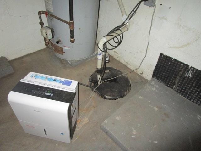 utility room with water heater