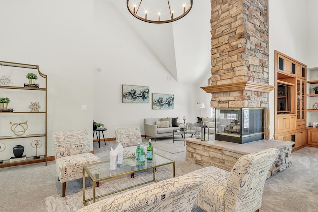 living room with light colored carpet, a notable chandelier, and high vaulted ceiling