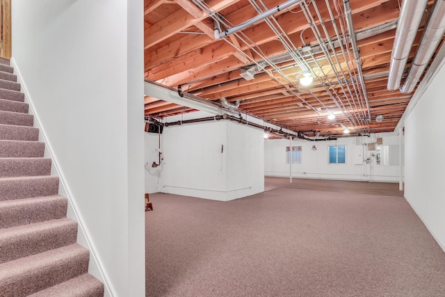 basement with carpet flooring