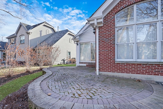 back of property with a patio area