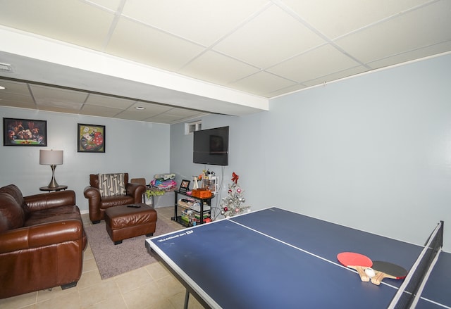 game room featuring light tile patterned flooring and a drop ceiling