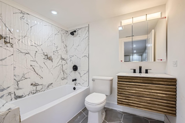 full bathroom featuring vanity, toilet, tiled shower / bath combo, and tile patterned flooring