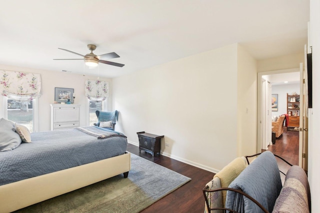 bedroom featuring dark hardwood / wood-style floors and ceiling fan