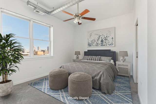 bedroom featuring ceiling fan and carpet floors