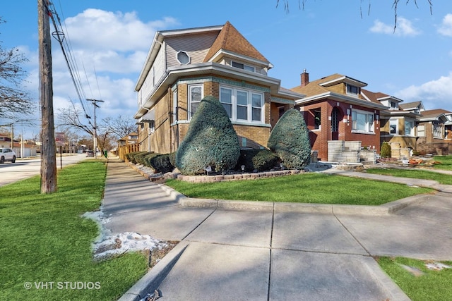 view of front of home with a front yard