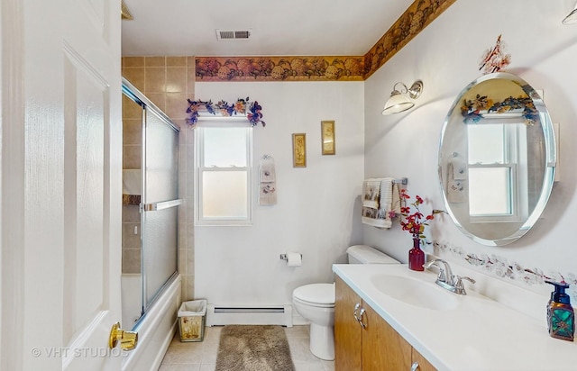 full bathroom featuring toilet, shower / bath combination with glass door, a baseboard radiator, vanity, and tile patterned flooring