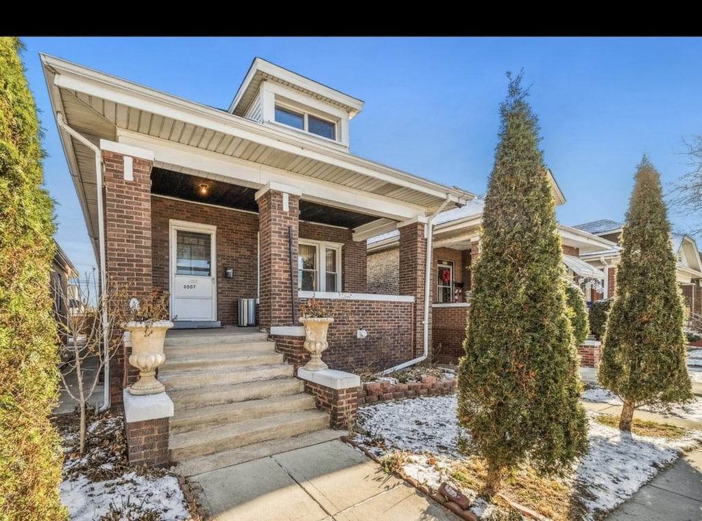 view of front of house with covered porch