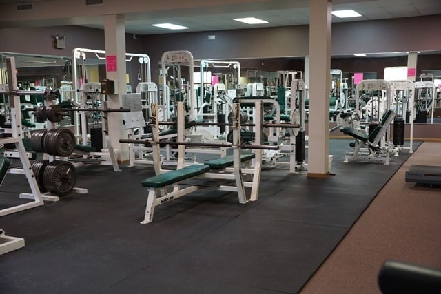 workout area featuring a drop ceiling