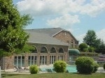 rear view of house with a yard