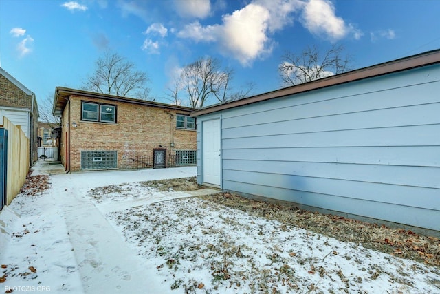 view of snow covered property