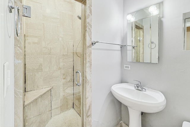 bathroom featuring an enclosed shower