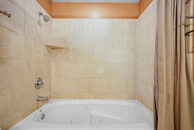 bathroom with shower / bath combo with shower curtain