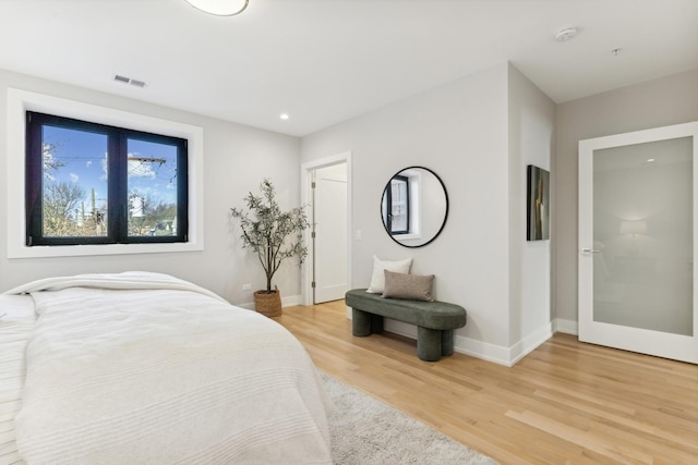 bedroom featuring wood-type flooring