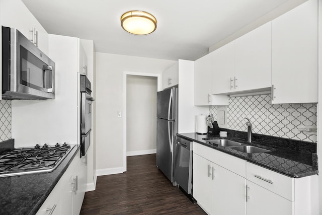 kitchen featuring white cabinetry, stainless steel appliances, and sink