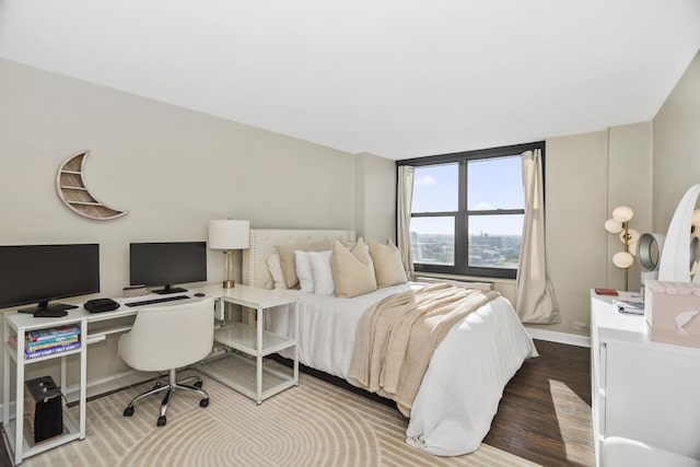 bedroom with wood-type flooring