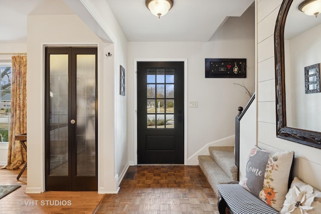 entrance foyer with dark parquet floors