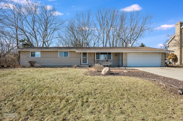 ranch-style home with a garage and a front yard