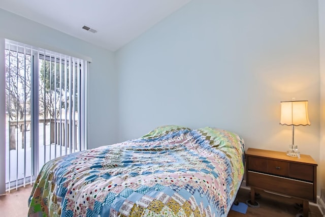 bedroom featuring carpet