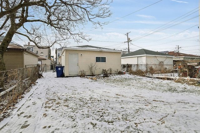 view of snow covered house