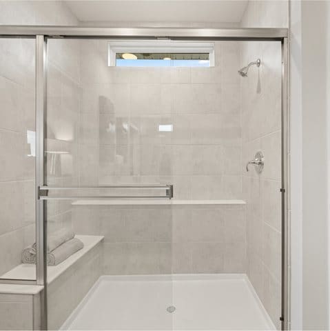 bathroom featuring walk in shower