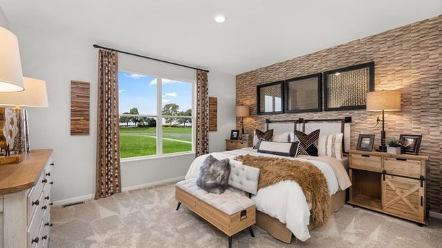 bedroom with light carpet