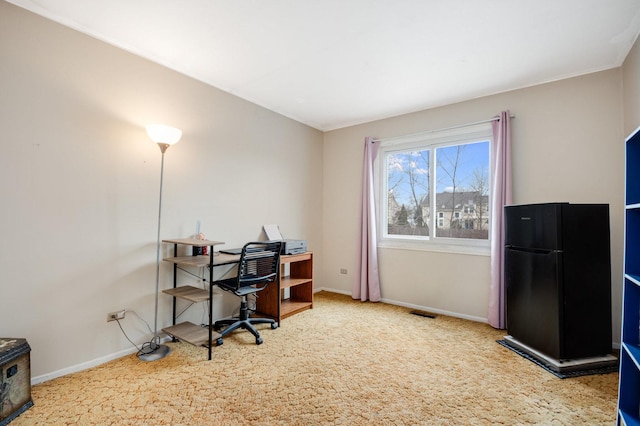 office with carpet flooring and baseboards