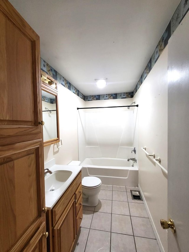 full bathroom featuring vanity, tub / shower combination, tile patterned floors, and toilet