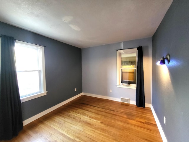 empty room featuring light wood-type flooring