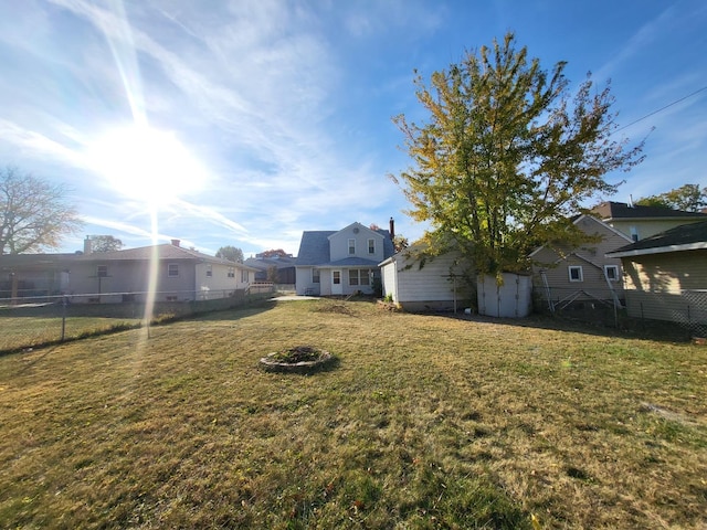 view of yard with a storage shed