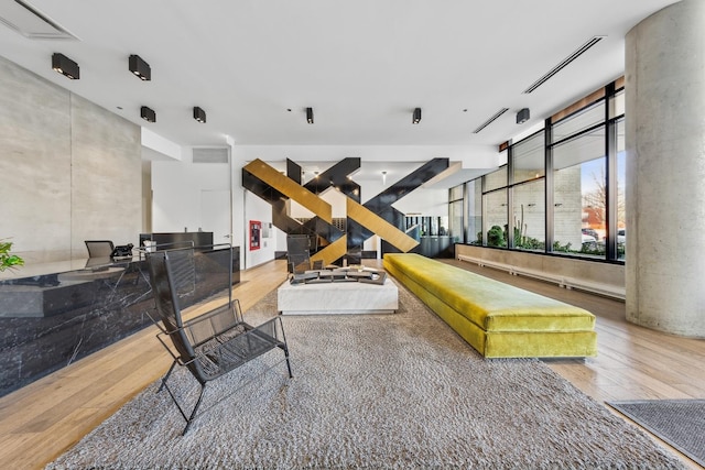 playroom with wood-type flooring