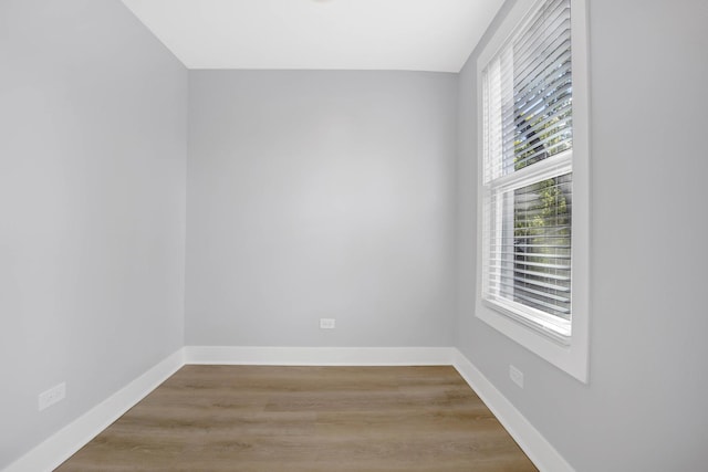 spare room with light hardwood / wood-style flooring