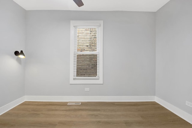 unfurnished room featuring wood-type flooring and ceiling fan