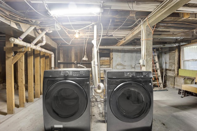 basement featuring washing machine and dryer