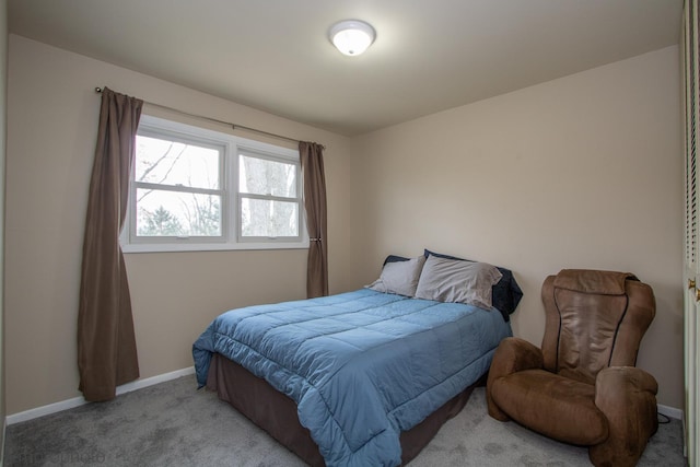 bedroom with light colored carpet