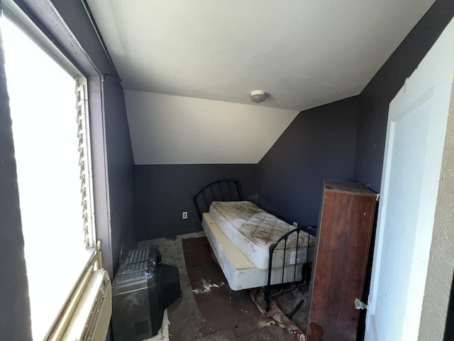 bedroom with vaulted ceiling