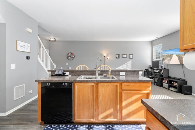 kitchen with sink, dark hardwood / wood-style floors, and dishwasher