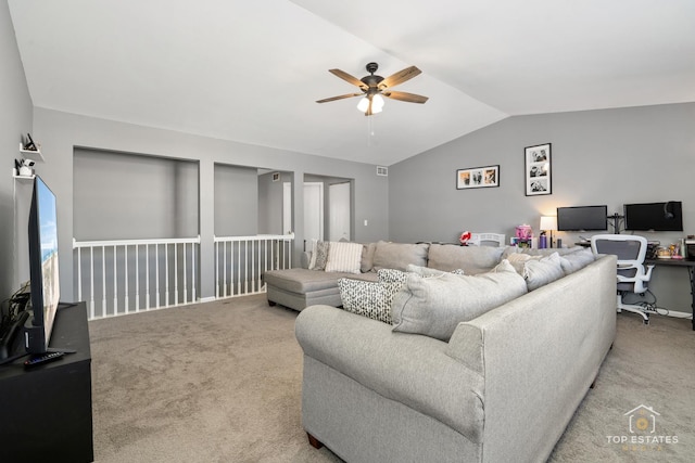 living room with lofted ceiling, carpet floors, and ceiling fan