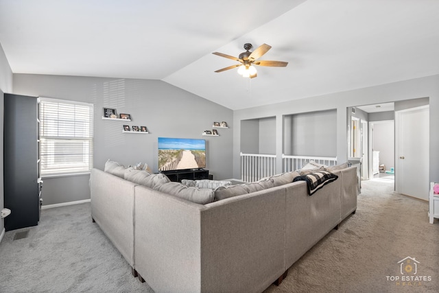 living room featuring light carpet, vaulted ceiling, and ceiling fan