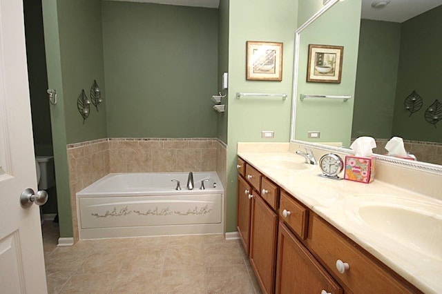 bathroom with vanity, a bath, and tile patterned flooring