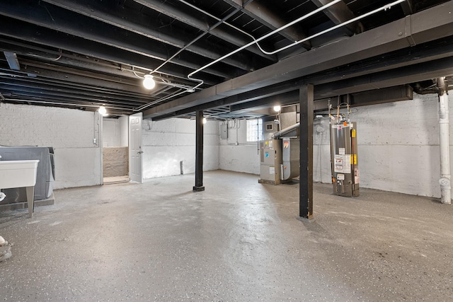 basement with heating unit and gas water heater