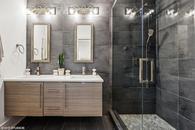 bathroom with walk in shower and vanity