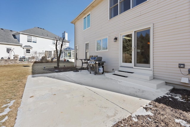 back of house with a patio