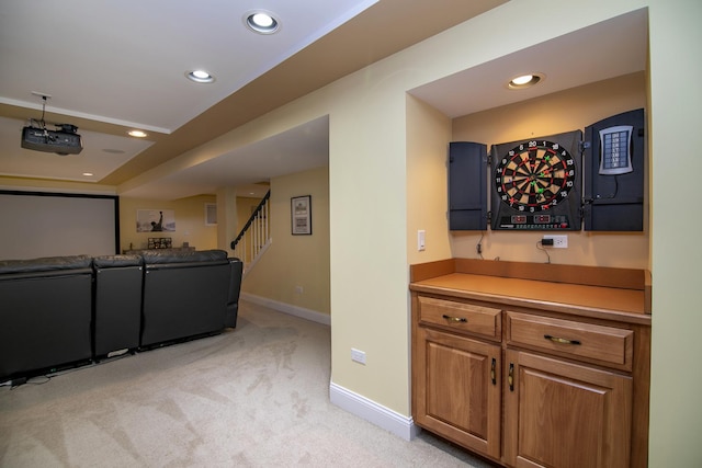 home theater featuring light colored carpet