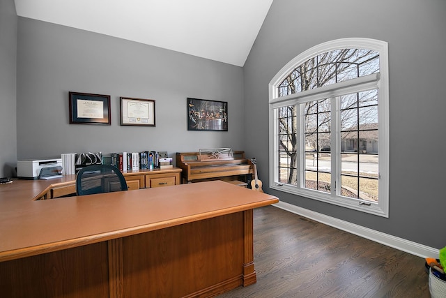 office with dark hardwood / wood-style flooring and lofted ceiling