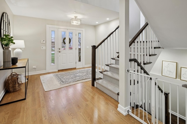 foyer entrance featuring wood-type flooring