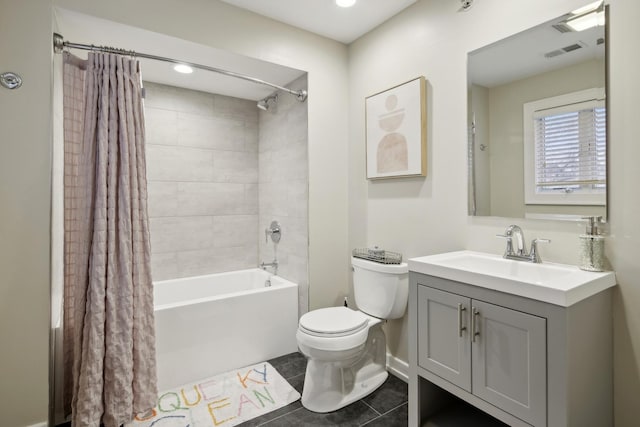 full bathroom with vanity, tile patterned floors, toilet, and shower / bath combo