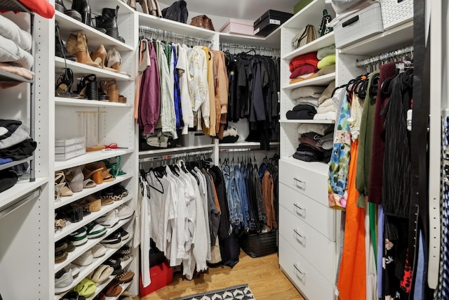 walk in closet featuring light wood-type flooring