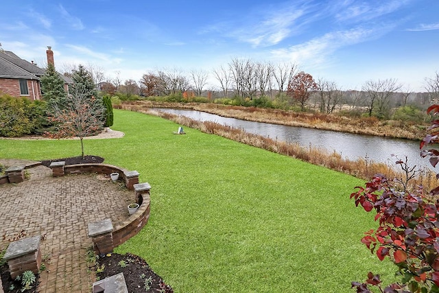 view of yard with a water view